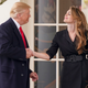 President Donald Trump shakes hands with outgoing White House Communications Director Hope Hicks on her last day.